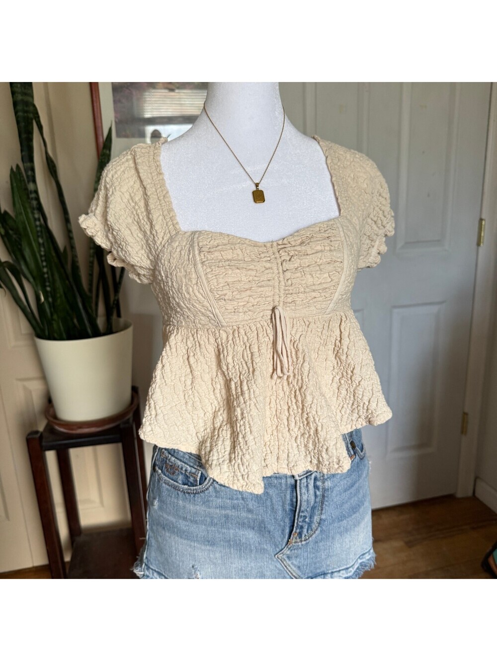 Beige Textured Short Sleeve Peplum Top with Open Back